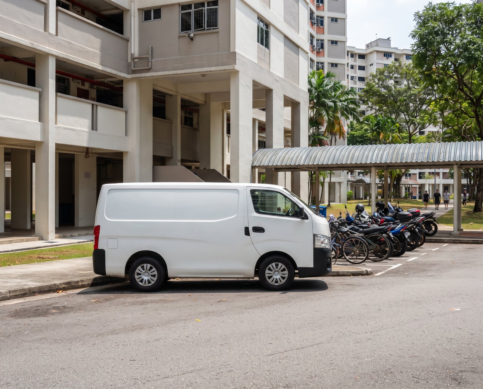 Daljit Aircon service van parked outside an HDB block in Singapore